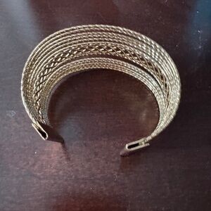 Gold, open-cuff bangle
